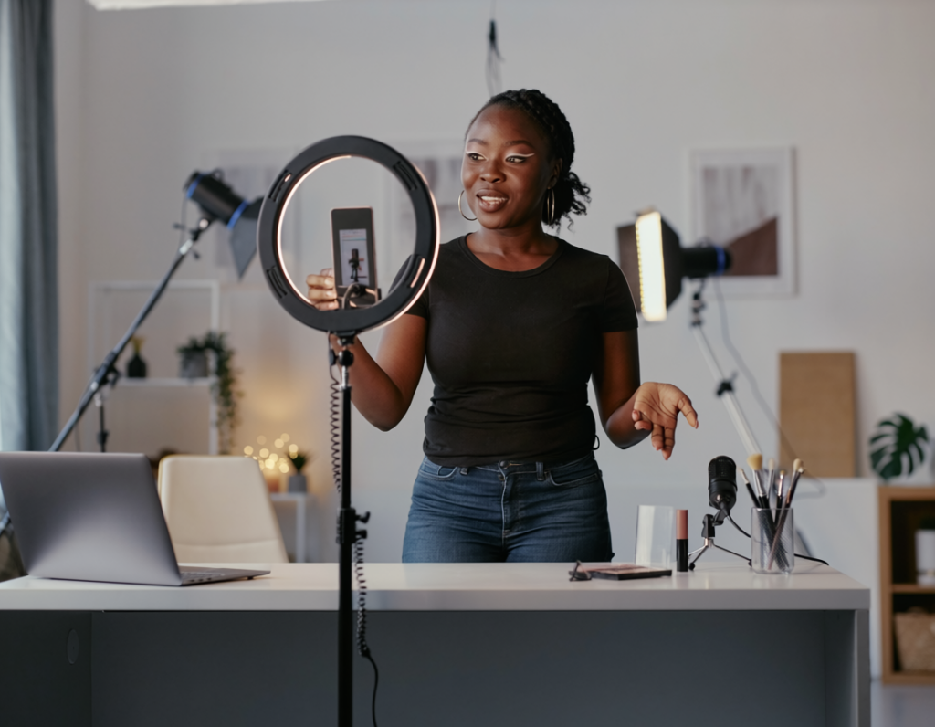 firefly photorealistic editorial image of a content creator filming a short video with a smar 241454